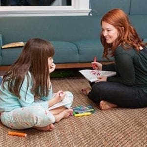 Mom smiling at daughter