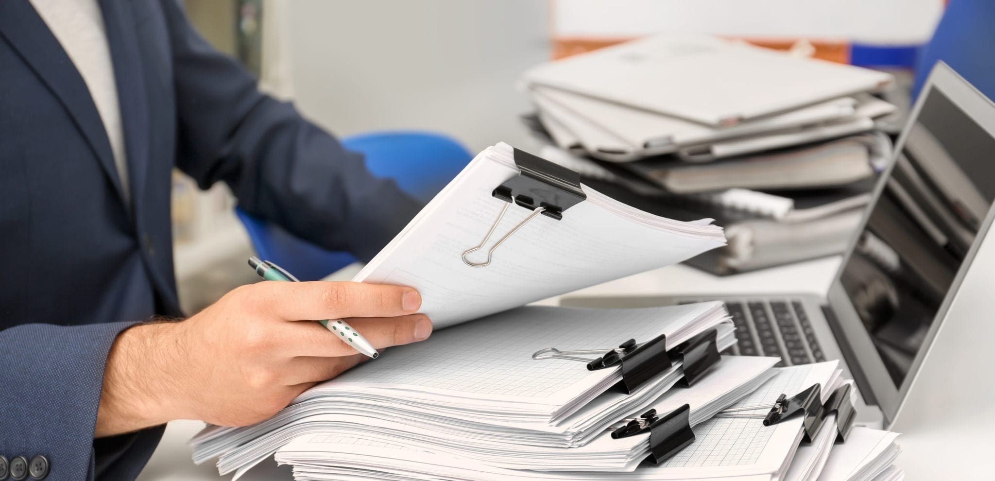 Man working with documents on table