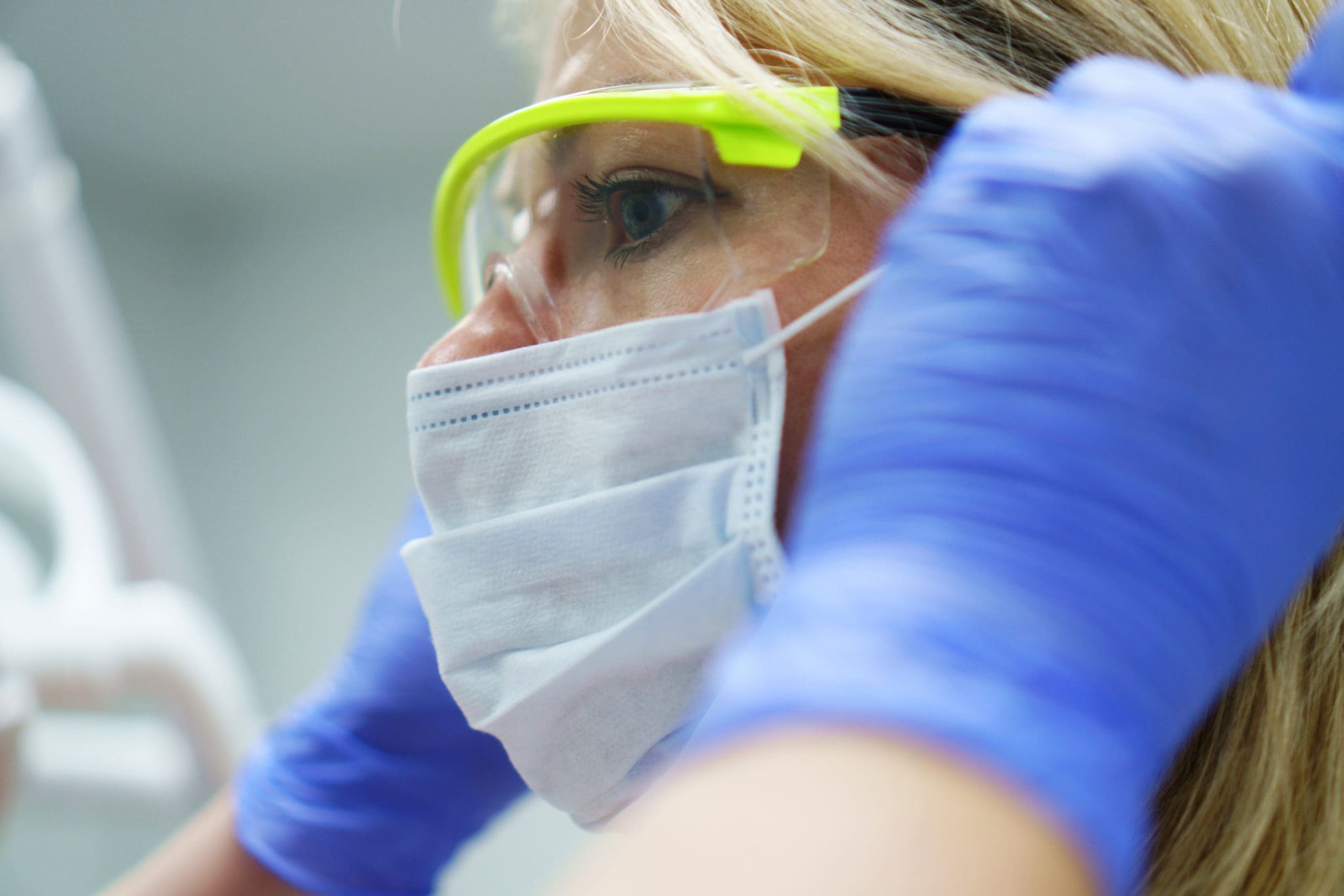 Female worker wearing a mask