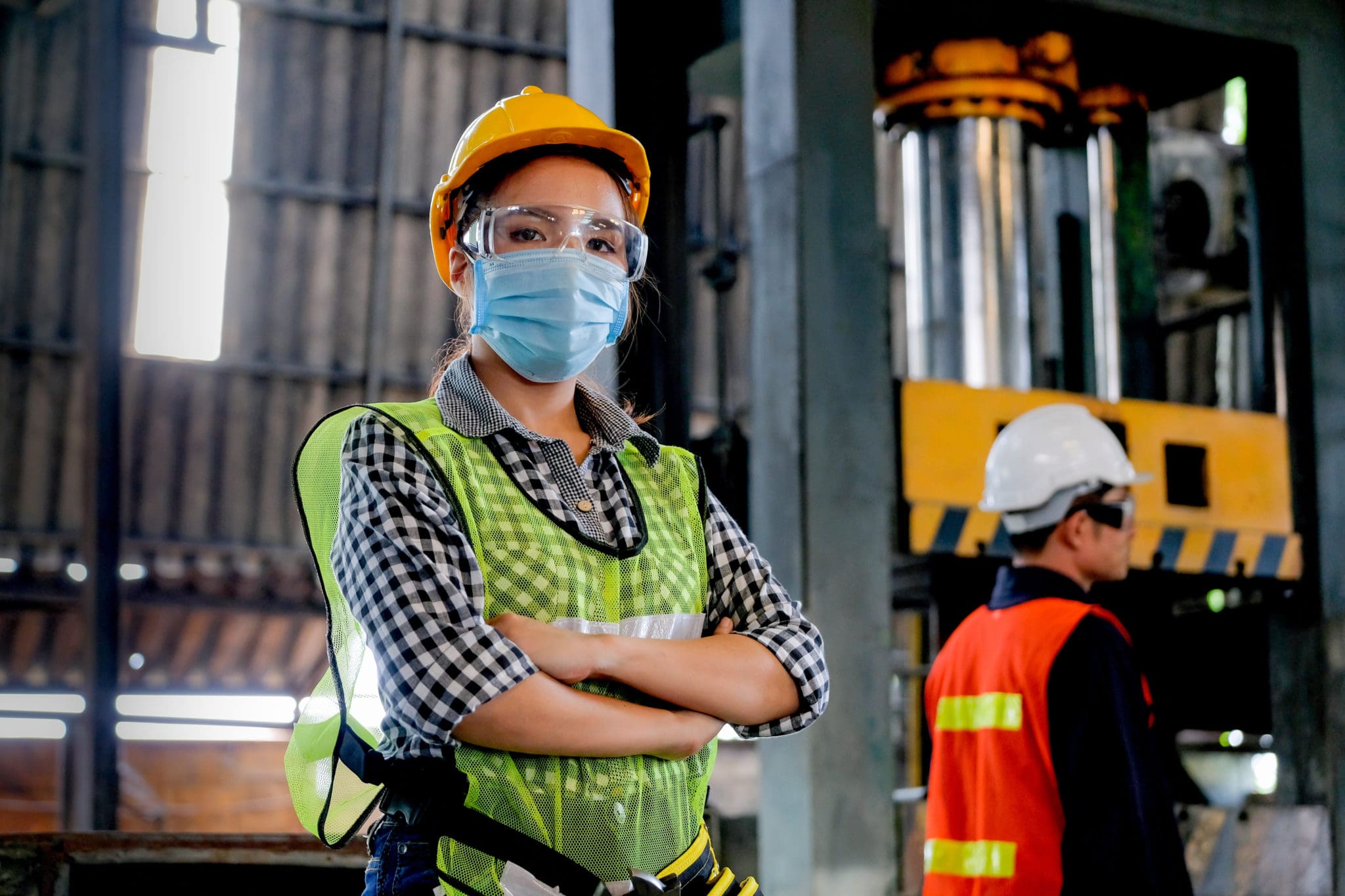 Female worker wearing a mask