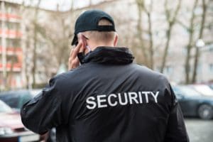 Security Teams Need More Than Just Radios - Security guard working outside